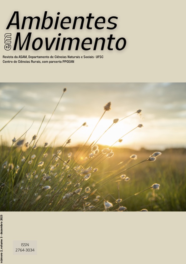 Revista Ambientes em Movimento, número2, volume2. Dezembro de 2022. Na capa uma foto de um beija-flor polinizando uma planta com flor azul.